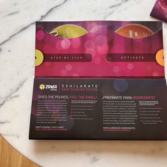 Zumba Fitness Exhilarate Body Shaping System w/ 2 Toning Sticks 5 Discs & Guide - Picture 10 of 16